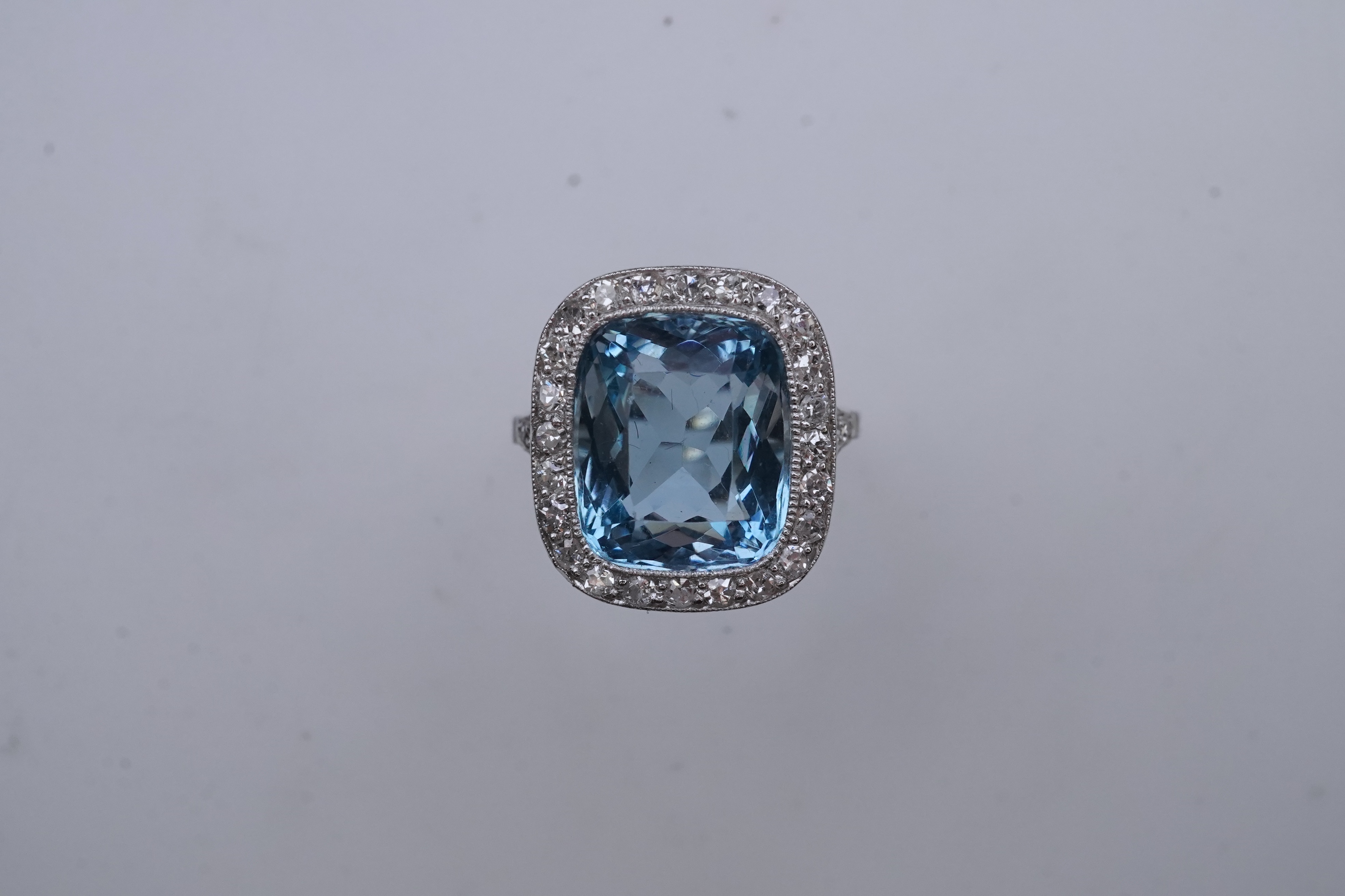 An attractive aquamarine and diamond ring